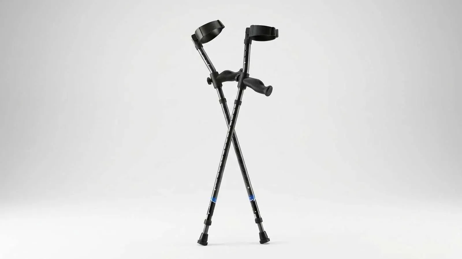 A pair of in-Motion Pro forearm crutches, showing the moulded handle, the forearm cuff and the spring-assisted lower post.